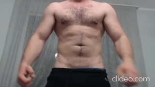 Strong alpha guy flexing on cam